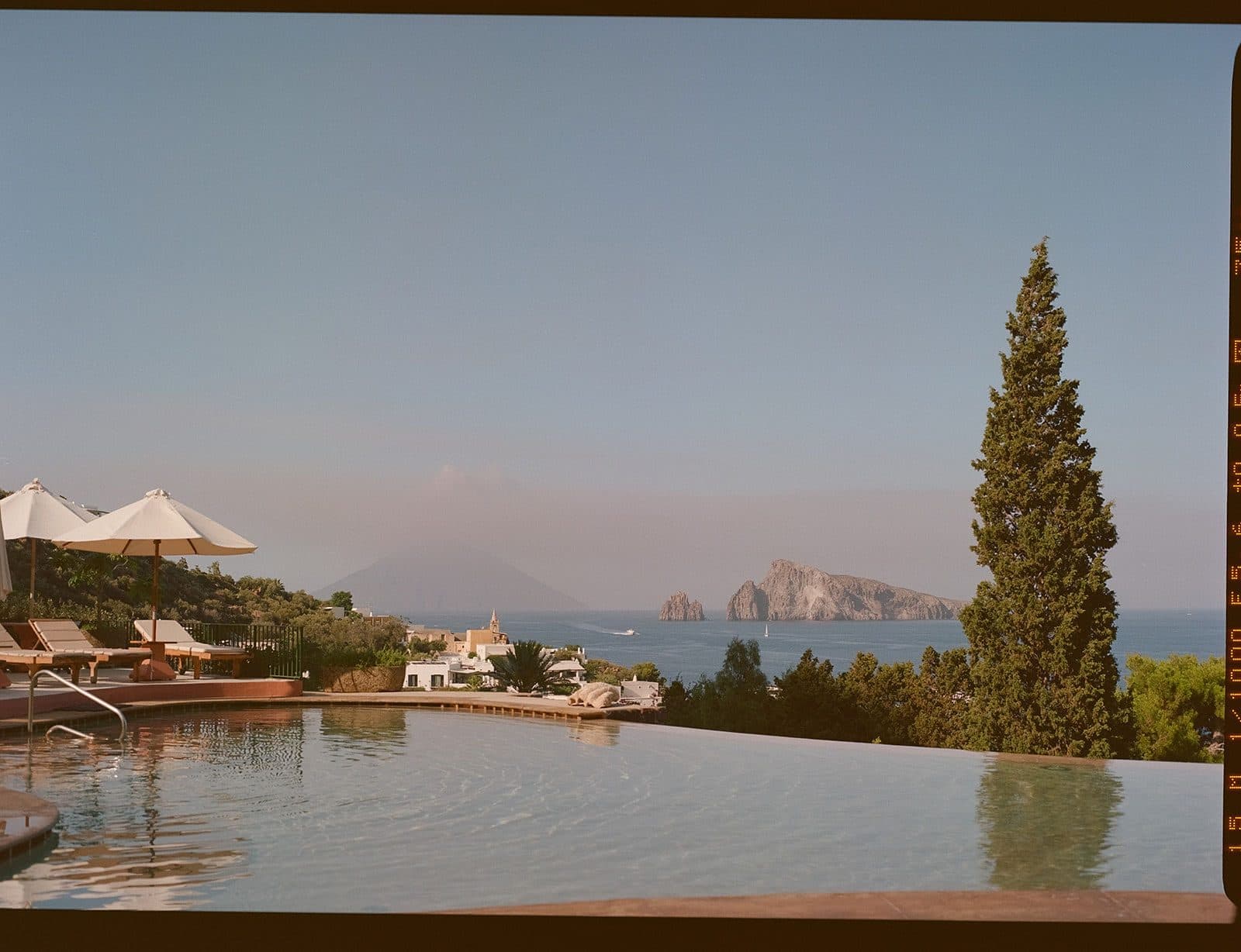 Infinity pool on the Sorrento peninsula looking towards Capri at dusk